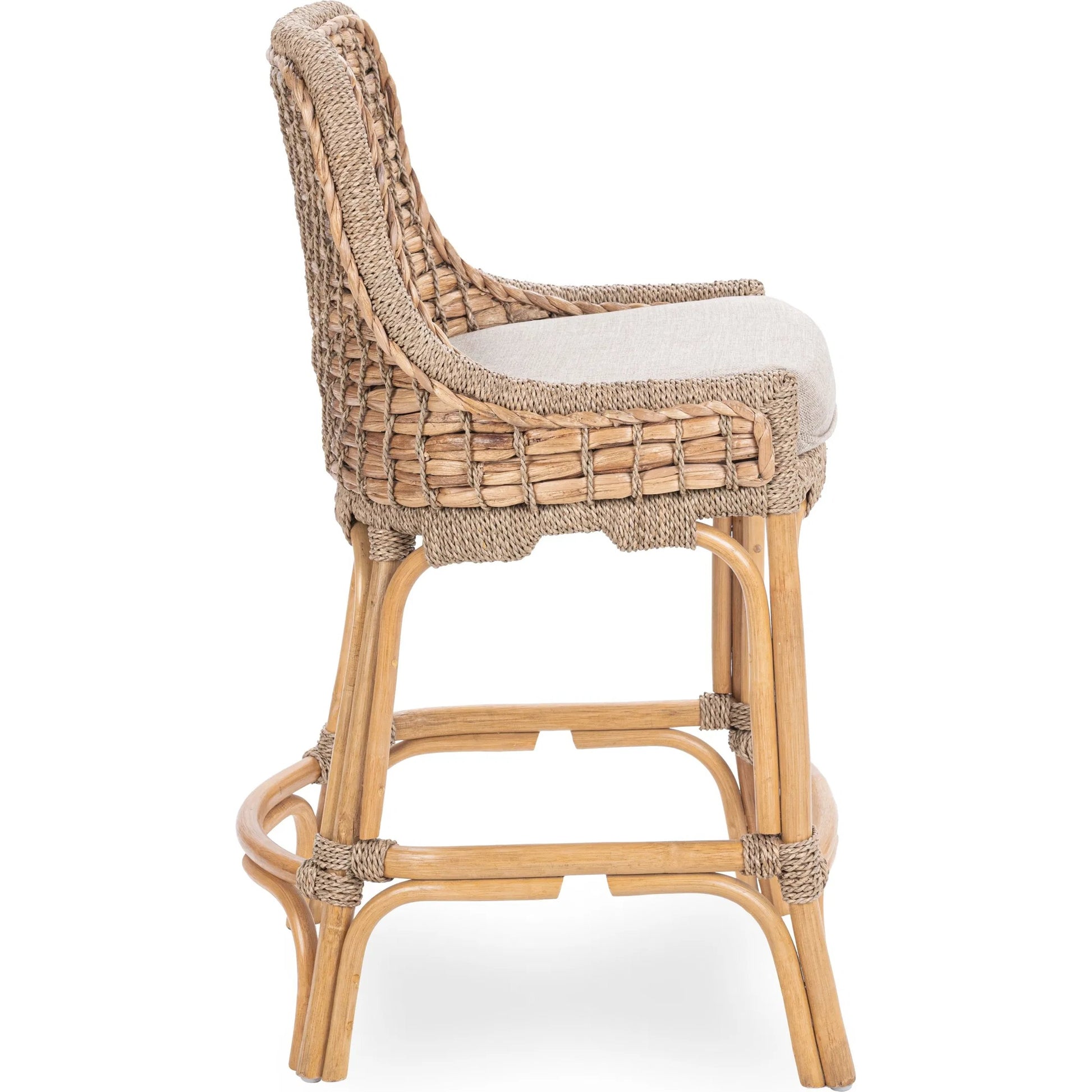 Nuevo Stool by Kosas Home in natural, truffle. Made from waterhycinth, seagrass, 100% polyester in a rustic style.