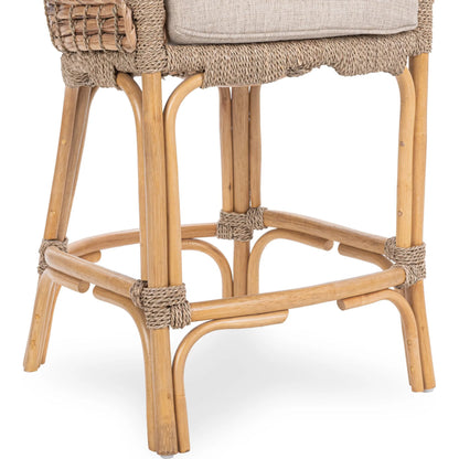 Nuevo Stool by Kosas Home in natural, truffle. Made from waterhycinth, seagrass, 100% polyester in a rustic style.