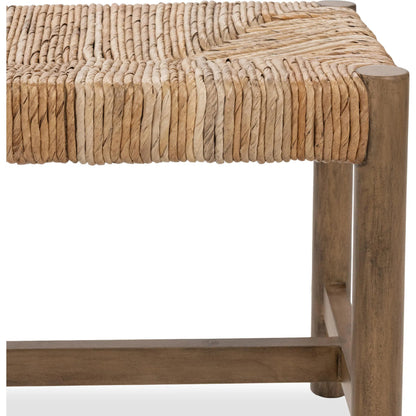 Zaylen Bench by Kosas Home in brown wash. Made from banana bark, mahogany wood in a rustic style.