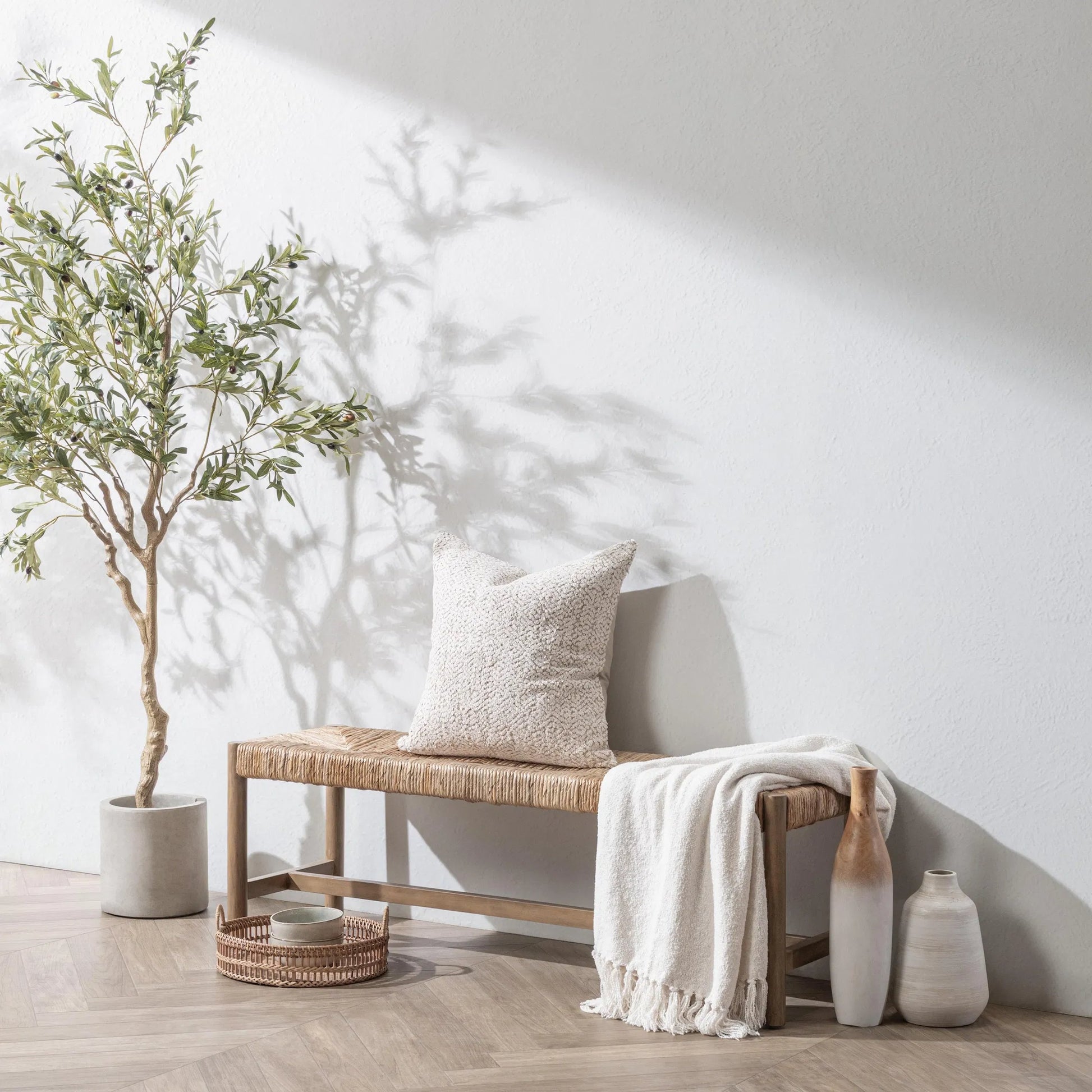 Zaylen Bench by Kosas Home in brown wash. Made from banana bark, mahogany wood in a rustic style.