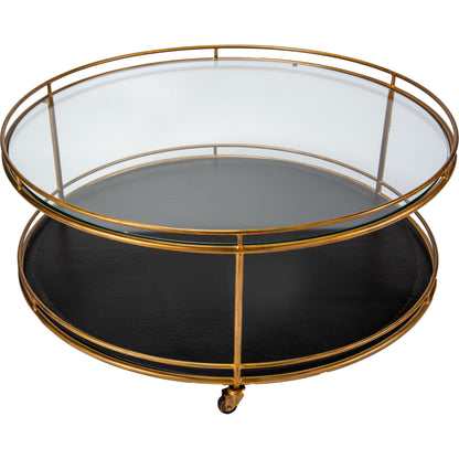 Trolley Cocktail Table by Sarreid Ltd. in gold and top shelf glass lower shelf leathr. Made from glass, metal in a transitional style.