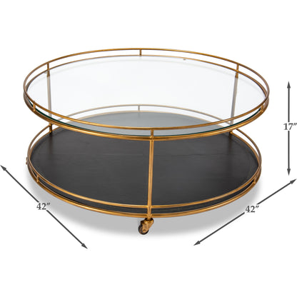 Trolley Cocktail Table by Sarreid Ltd. in gold and top shelf glass lower shelf leathr. Made from glass, metal in a transitional style.