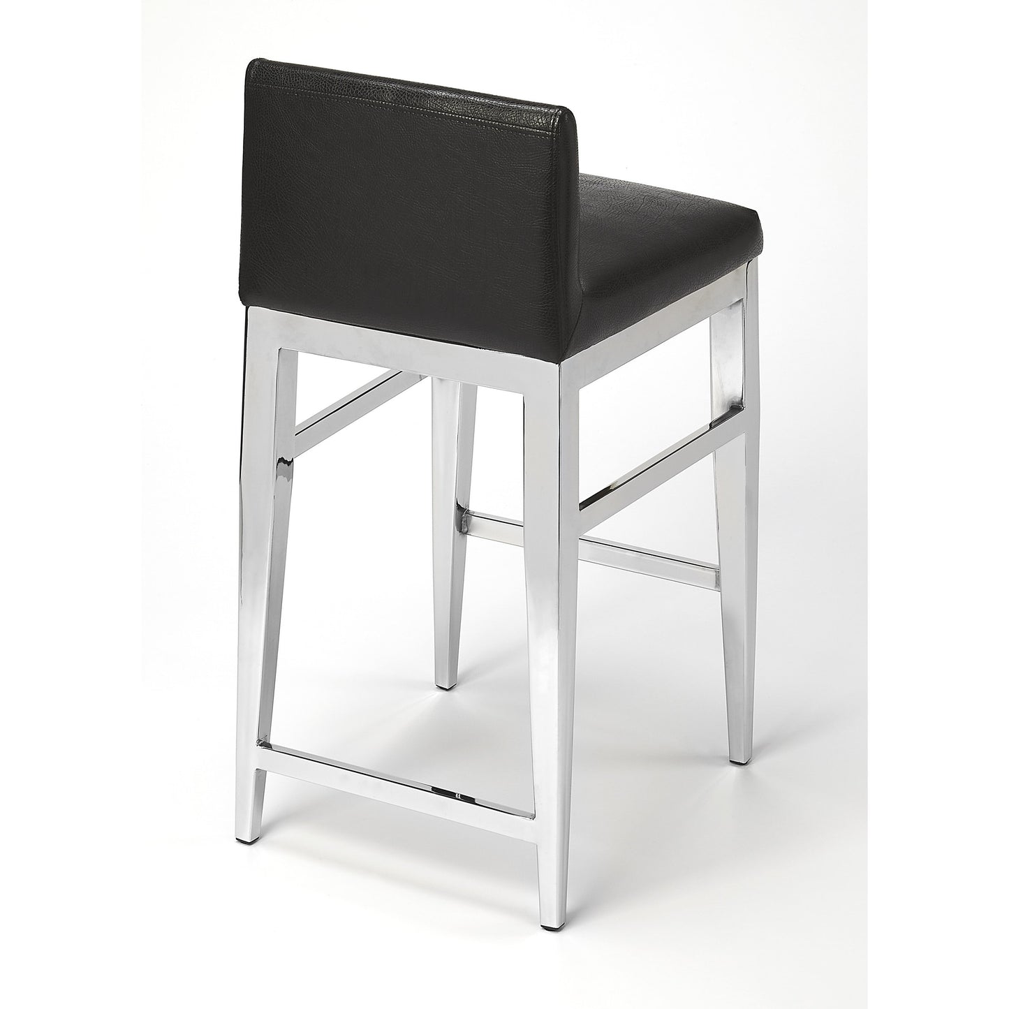 003 S-346270 | Additional Silo | Kelsey Stainless Steel Faux Leather Counter Stool by Butler Specialty Company in black and black. Made from stainless steel, polyurethane faux leather, urethane foam (7 fr) in a modern style.