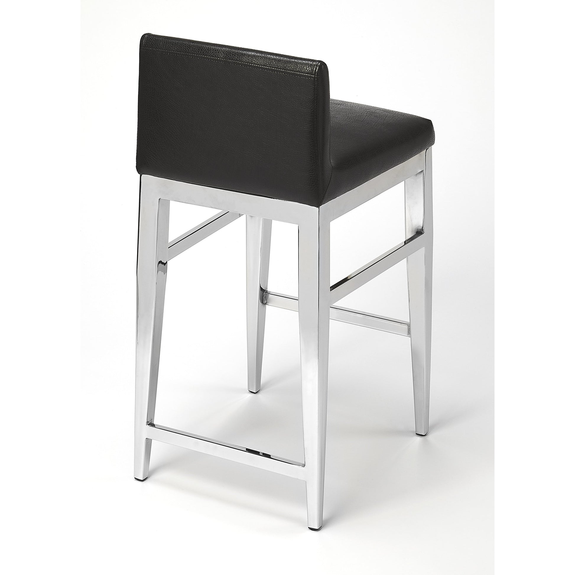 Kelsey Stainless Steel Faux Leather Counter Stool by Butler Specialty Company in black and black. Made from stainless steel, polyurethane faux leather, urethane foam (7 fr) in a modern style.