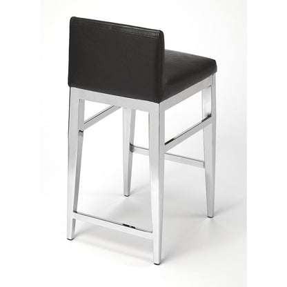 Kelsey Stainless Steel Faux Leather Counter Stool by Butler Specialty Company in black and black. Made from stainless steel, polyurethane faux leather, urethane foam (7 fr) in a modern style.