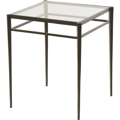 Lescot Side Table by Global Views in dark gunmetal bronze powder coat, gold edges, highlights. Made from iron, tempered glass in a modern style.