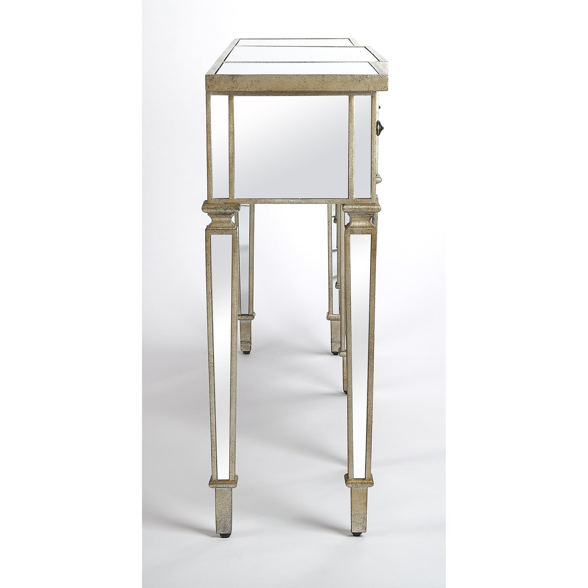 Hayworth Ed Console Table by Butler Specialty Company in silver and mirror. Made from mirror glass, birch wood, zinc metal hardware in a traditional style.