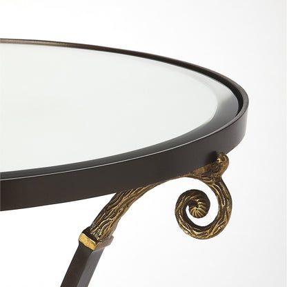 Meurice Glass & Metal Accent Table by Butler Specialty Company in black and metalworks. Made from aluminum, iron, mdf, beveled mirrored glass, finish: antique copper, brass in a traditional style.