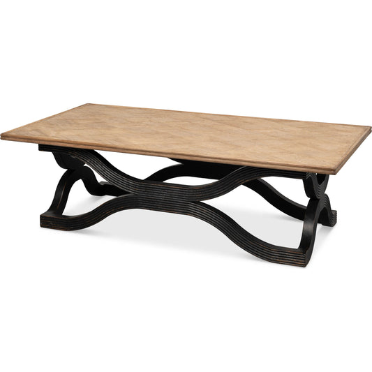Wavy Coffee Table by Sarreid Ltd. in antique black. Made from reclaimed pine in a unique style.