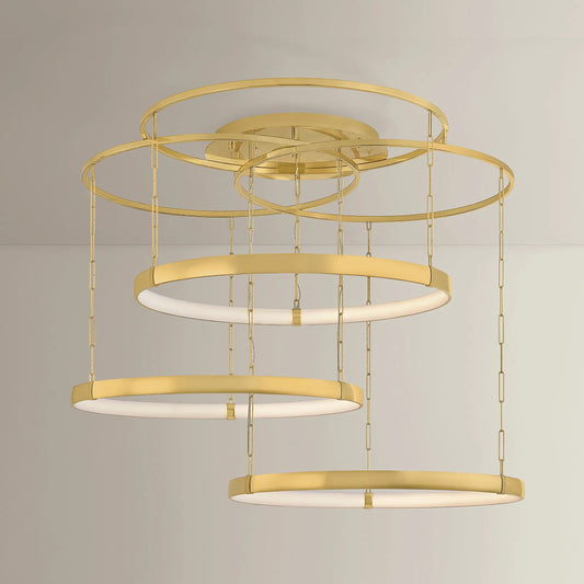 Chiasso Chandelier by Corbett in vintage polished brass. Made from unique in a modern style.