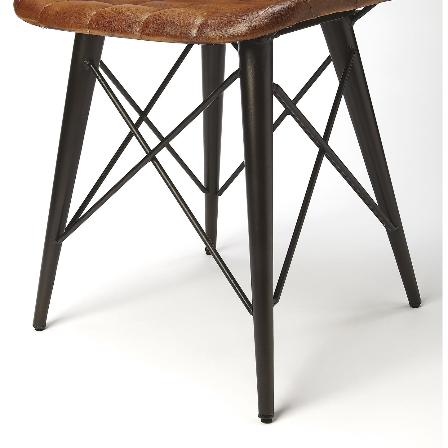 006 SR-770498 | Closeup | Patty Side Chair by Butler Specialty Company in medium brown and brown leather. Made from iron, leather, plastic, tris free fr foam in a modern style.