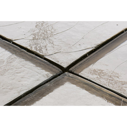 Titus Coffee Table by Sarreid Ltd. in bronze and cast glass top. Made from unique in a modern style.
