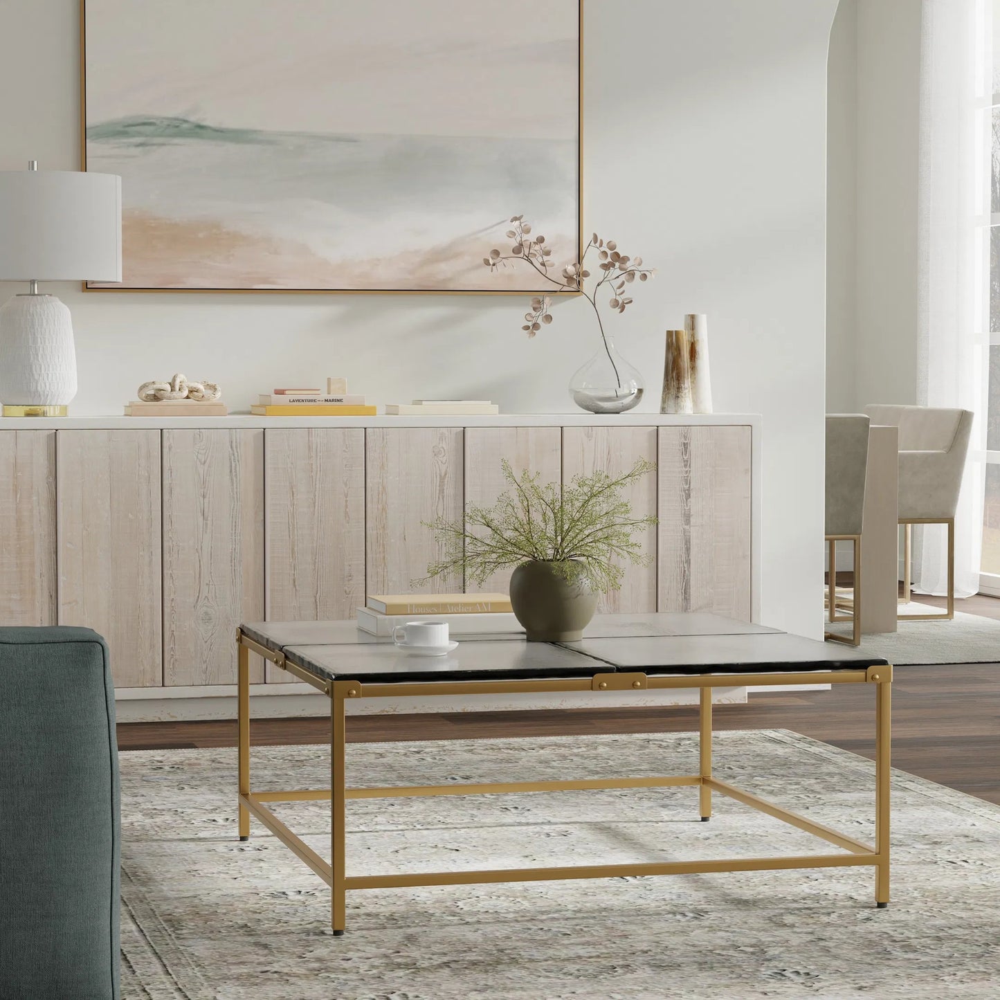015 SI-2372580 | Lifestyle | Titus Coffee Table by Sarreid Ltd. in bronze and cast glass top. Made from unique in a modern style.
