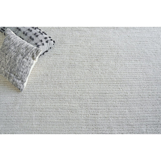Urth 5396 Rug by Exquisite Rugs in cream. Made from new zealand wool in a unique style.