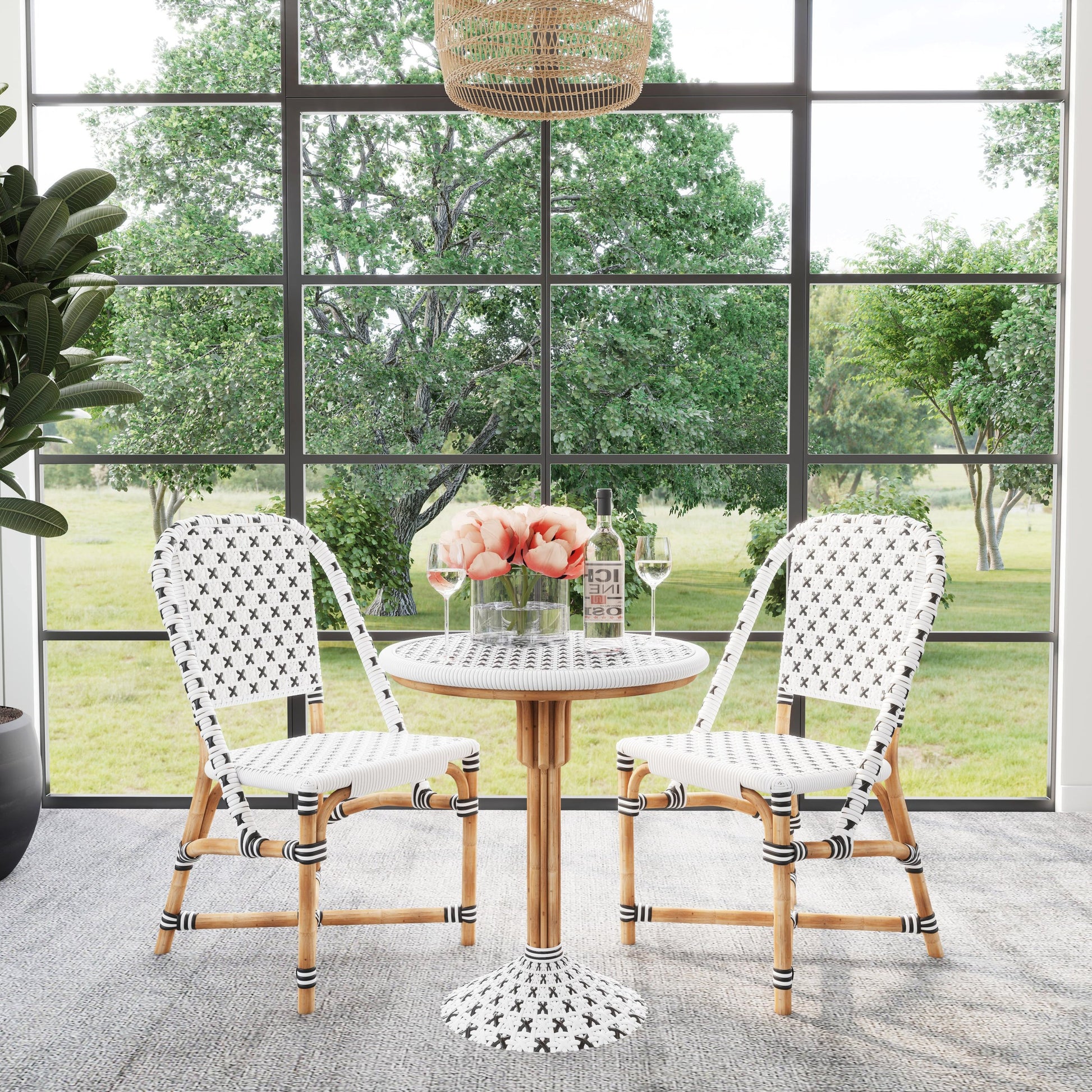 Tenor Dining Chair by Butler Specialty Company in white. Made from 60%-pe plastic weave, 40%-rattan in a coastal style.