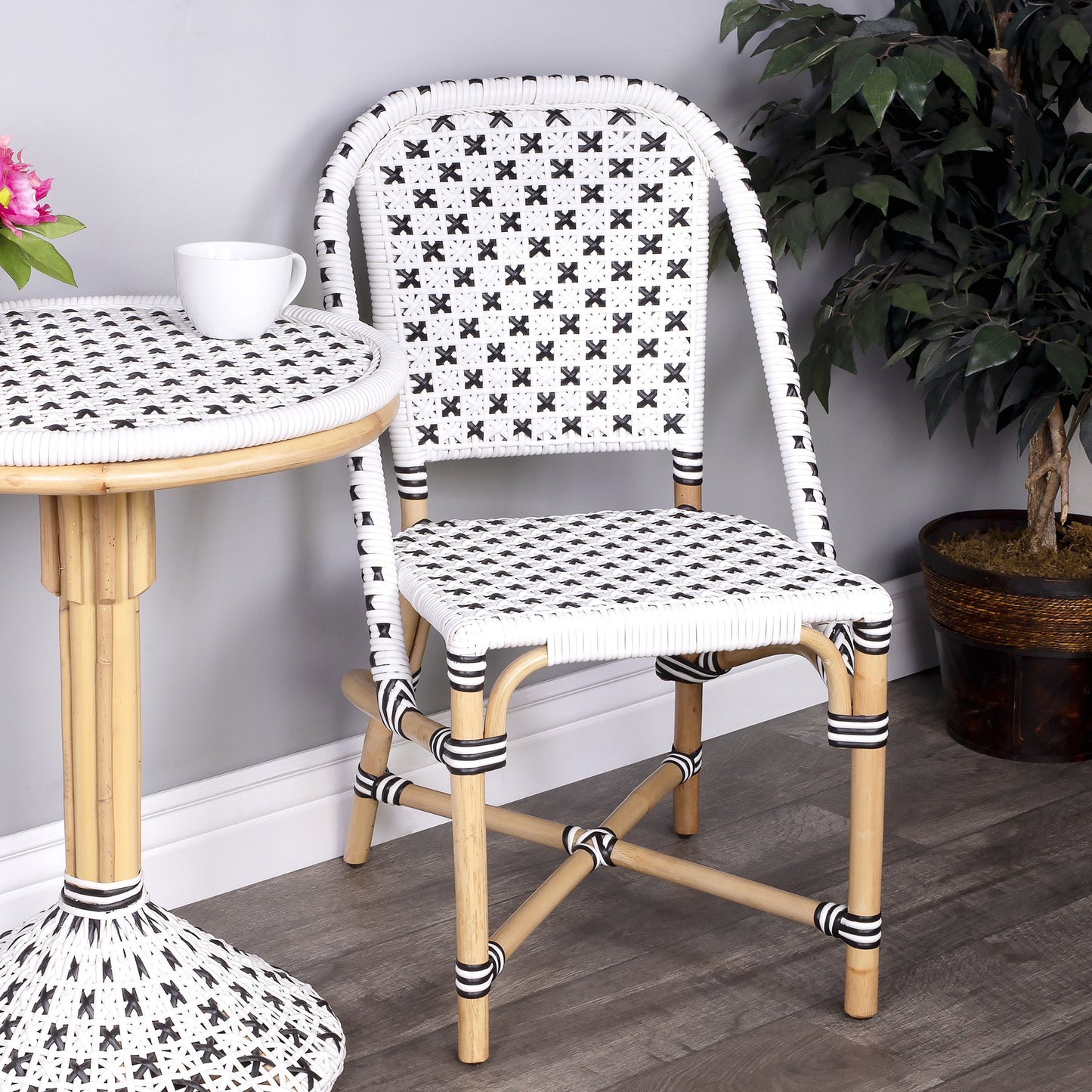 007 SR-770515 | Lifestyle | Tenor Dining Chair by Butler Specialty Company in white. Made from 60%-pe plastic weave, 40%-rattan in a coastal style.