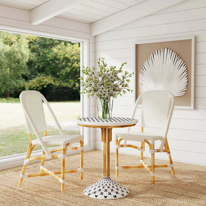 Tenor Dining Chair by Butler Specialty Company in white. Made from 60%-pe plastic weave, 40%-rattan in a coastal style.