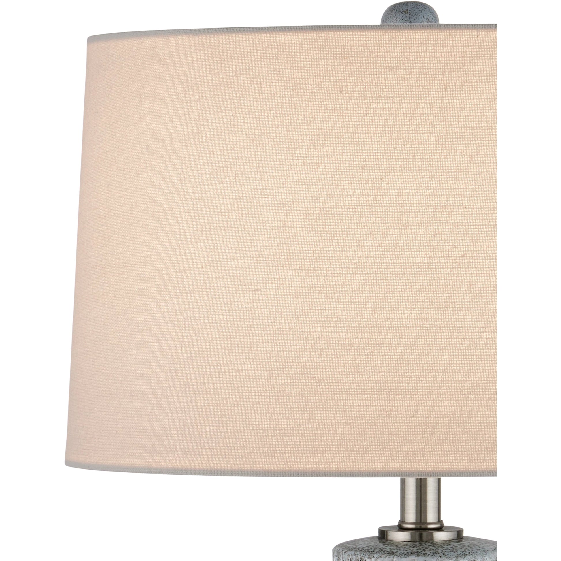 Fidella Table Lamp by Currey and Company in reactive black, white, brushed nickel. Made from ceramic in a modern style.