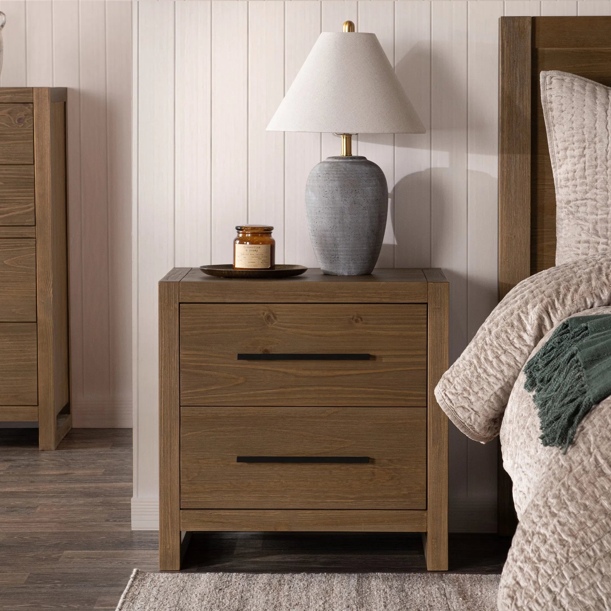 Fenmore Two-Drawer Pine Wood Nightstand by Kosas Home in honey brown. Made from pine wood in a transitional style.