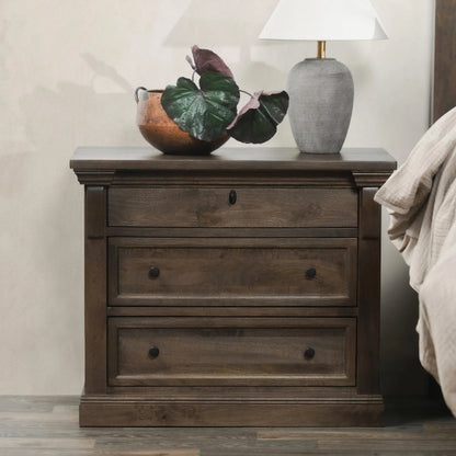 Adelaide Three-Drawer Mango Wood Nightstand by Classic Home in cocoa brown. Made from mango wood in a traditional style.