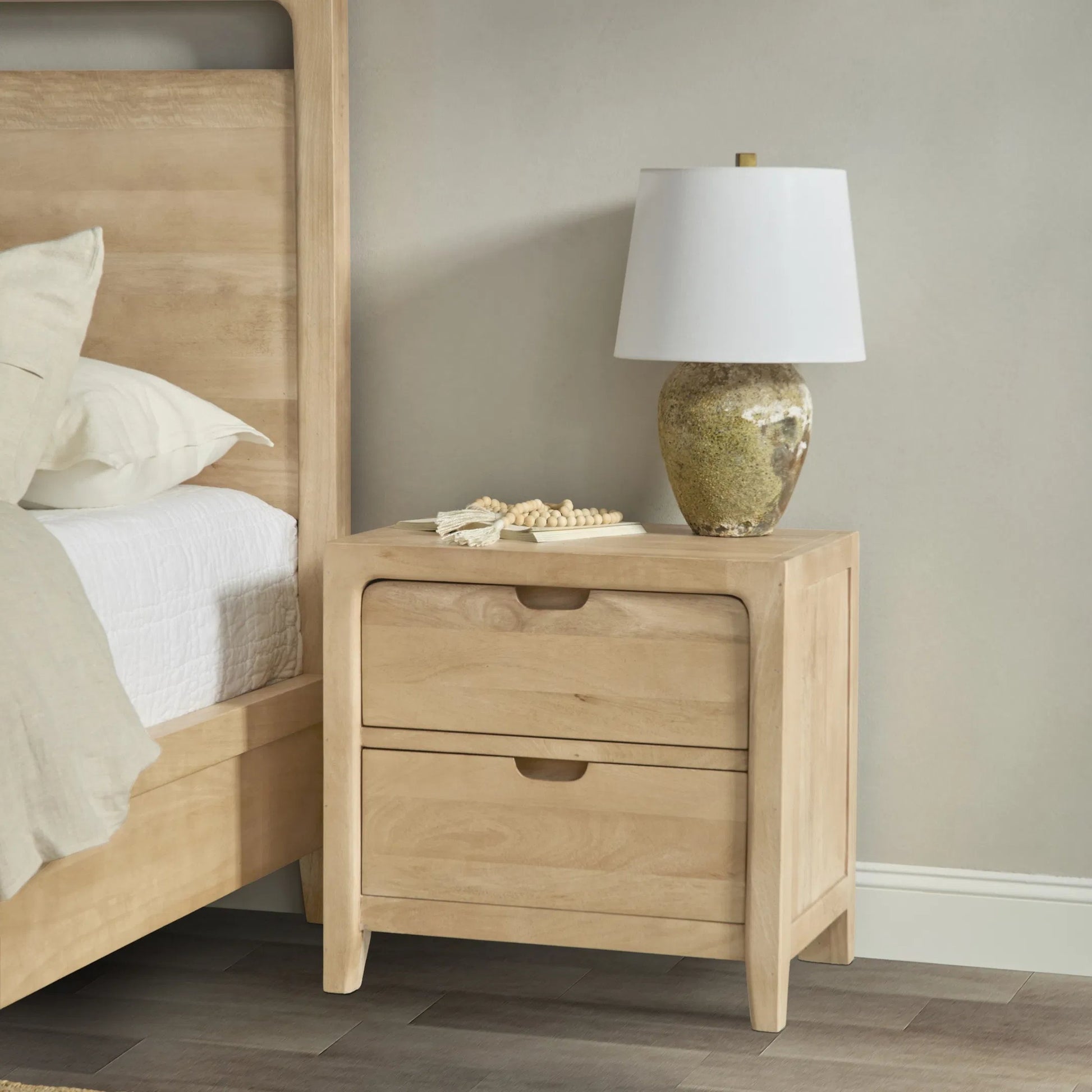 Laguna 2-Drawer Mango Wood Nightstand by Classic Home in natural. Made from mango wood in a unique style.