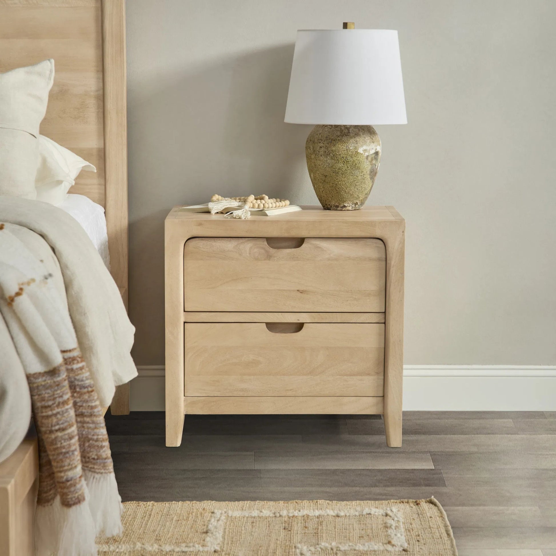 Laguna 2-Drawer Mango Wood Nightstand by Classic Home in natural. Made from mango wood in a unique style.