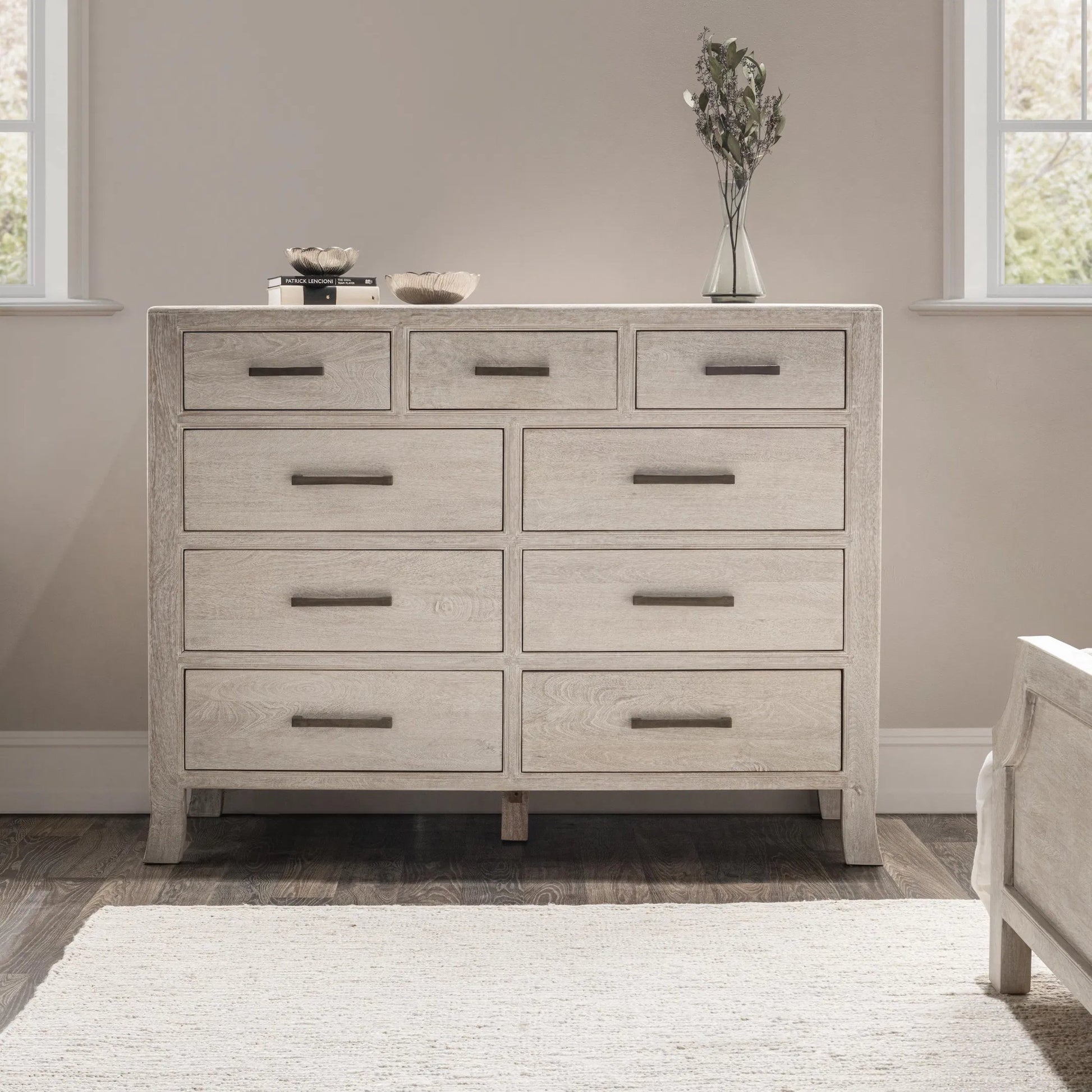 Westmont 9-Drawer Mango Wood Dresser by Classic Home. Made from mango wood in a transitional style.