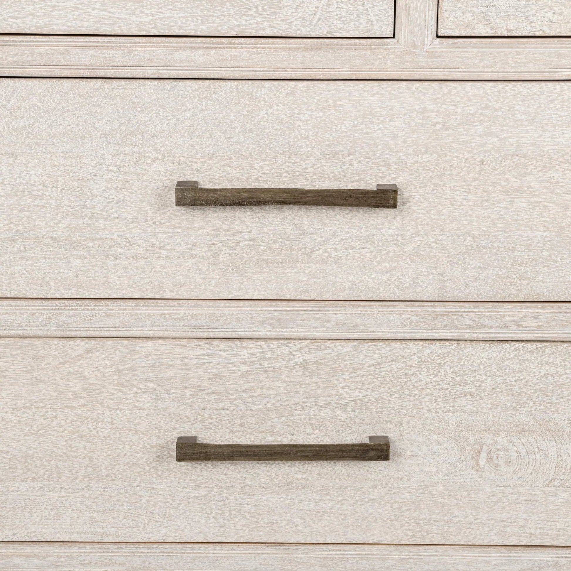 Westmont 9-Drawer Mango Wood Dresser by Classic Home. Made from mango wood in a transitional style.