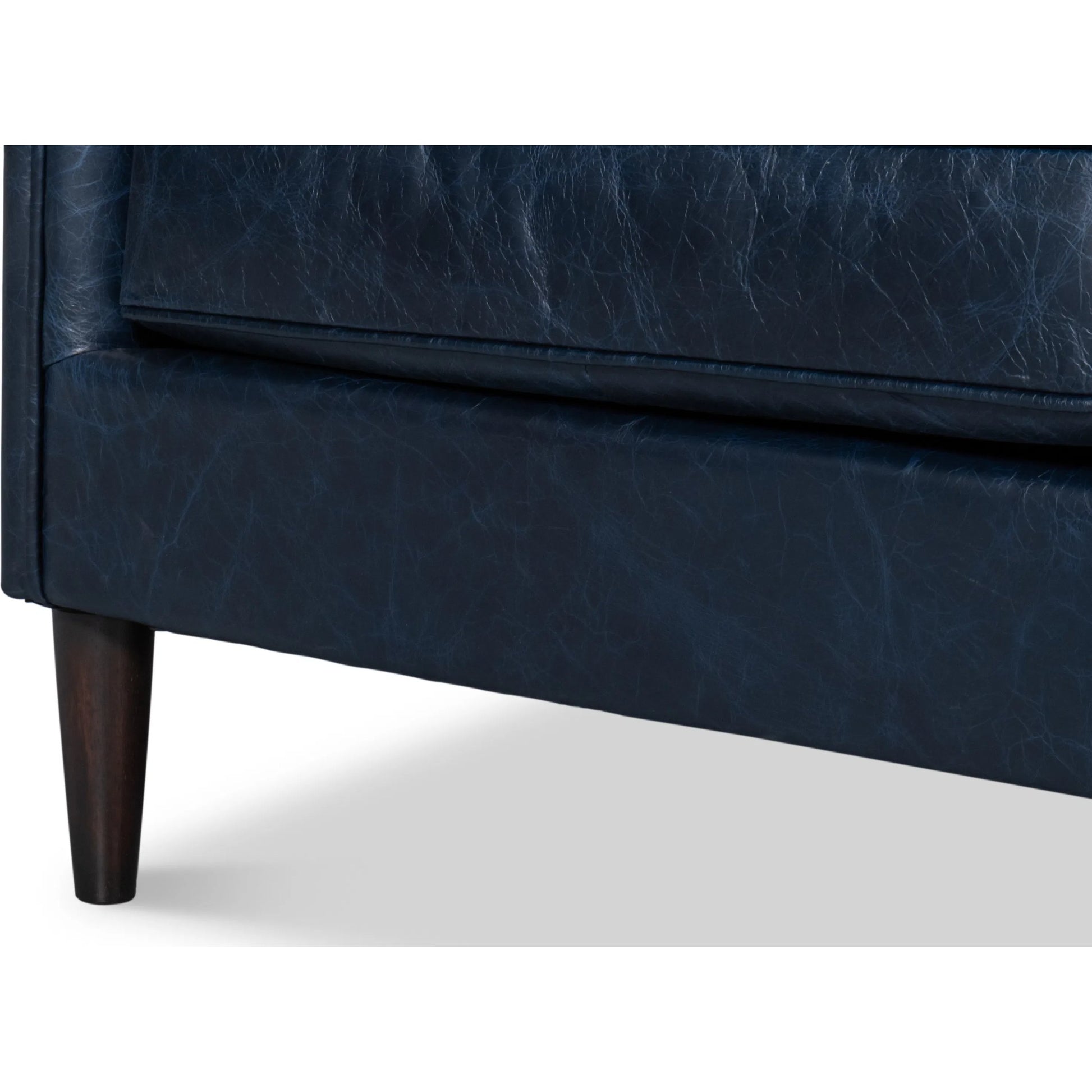 Alehandro Leather Sofa by Sarreid Ltd. in chateau blue. Made from leather, wood in a unique style.