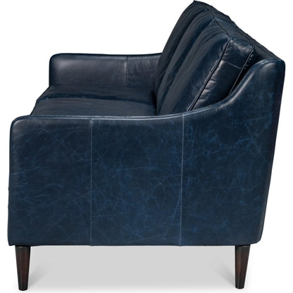 Alehandro Leather Sofa by Sarreid Ltd. in chateau blue. Made from leather, wood in a unique style.