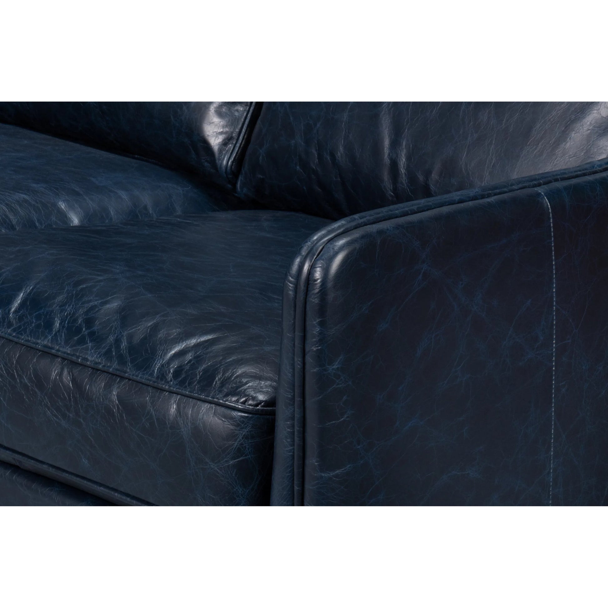 Alehandro Leather Sofa by Sarreid Ltd. in chateau blue. Made from leather, wood in a unique style.