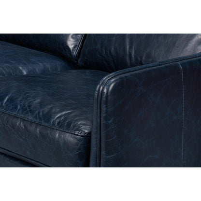Alehandro Leather Sofa by Sarreid Ltd. in chateau blue. Made from leather, wood in a unique style.