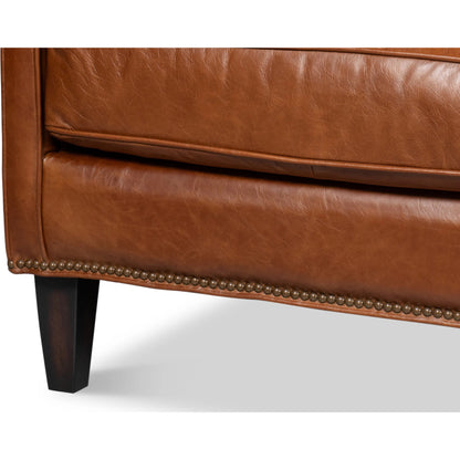 Philipe Distilled Leather Sofa by Sarreid Ltd. in havana brown. Made from leather in a traditional style.