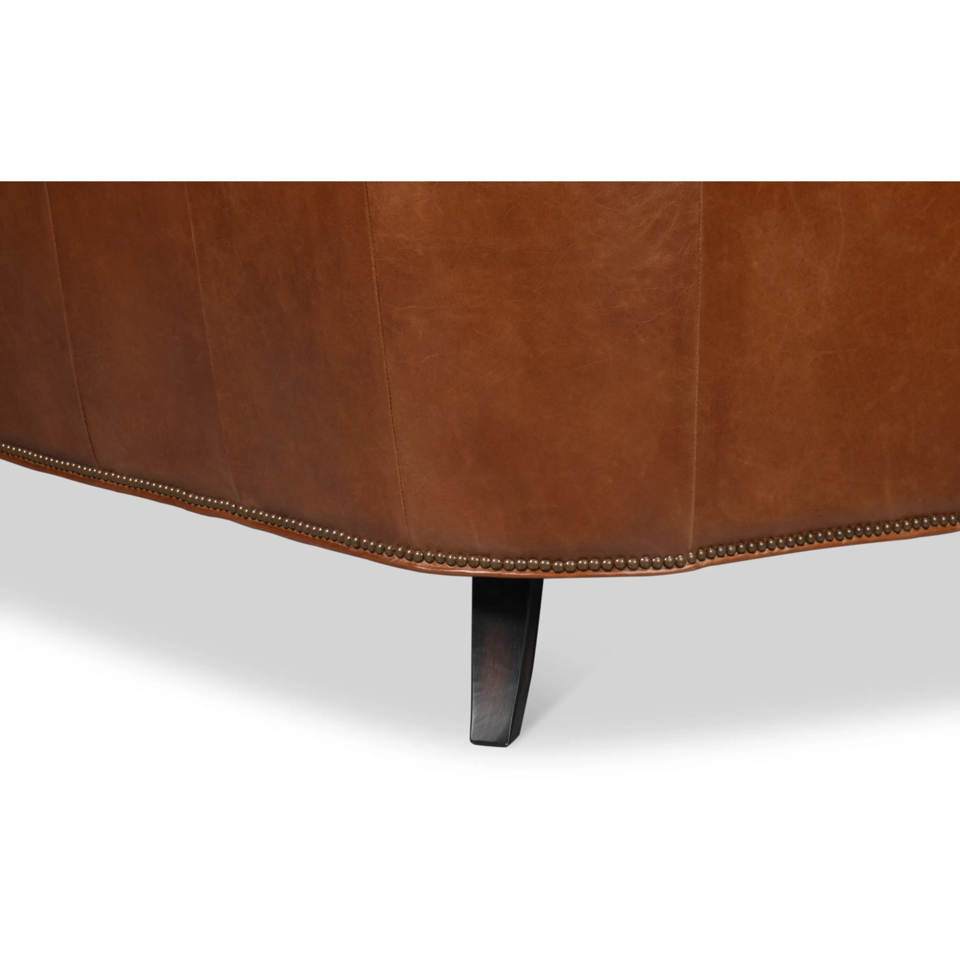 Philipe Distilled Leather Sofa by Sarreid Ltd. in havana brown. Made from leather in a traditional style.