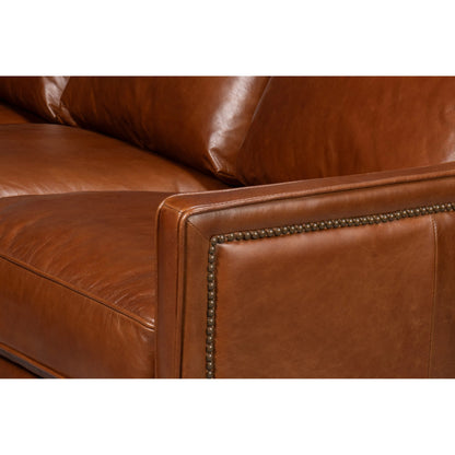Philipe Distilled Leather Sofa by Sarreid Ltd. in havana brown. Made from leather in a traditional style.