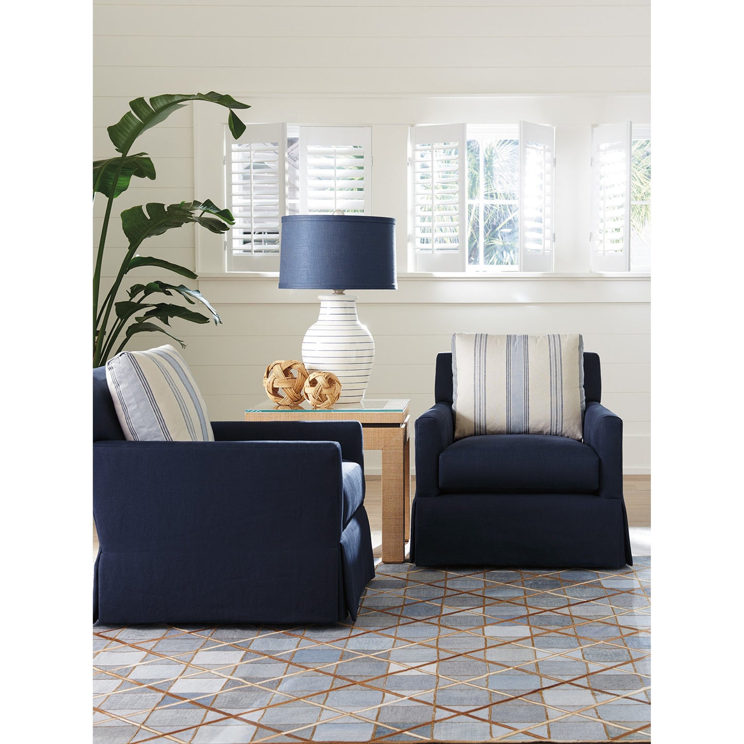 003 SR-834910 | Lifestyle | Harlow Swivel Chair by Barclay Butera in navy. Made from unique in a traditional style.