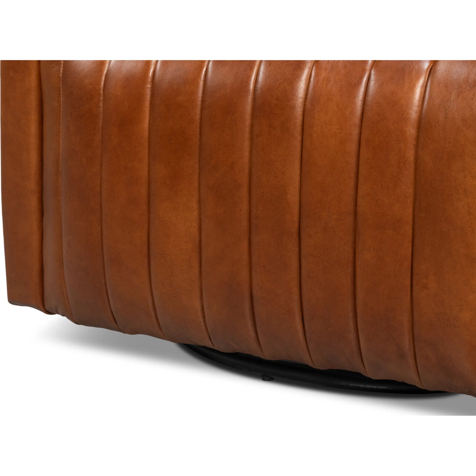 Essex Swivel Chair by Sarreid Ltd.. Made from cow leather in a traditional style.