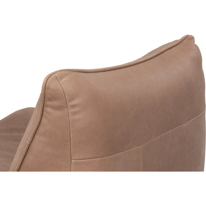 Kennett Swivel Chair by Sarreid Ltd.. Made from leather in a traditional style.