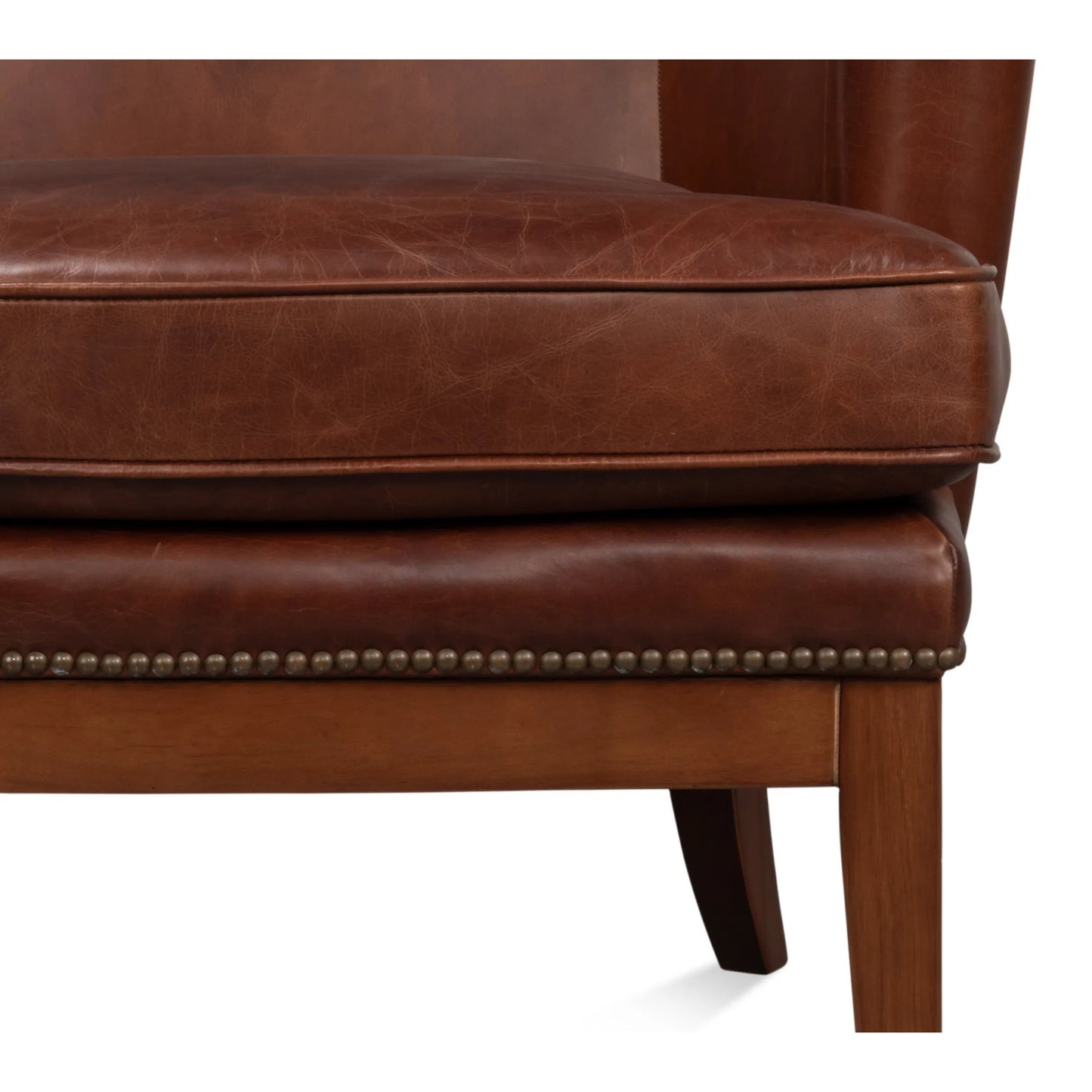 010 SI-2369167 | Closeup | Smithfield Wing Chair by Sarreid Ltd. in newark brown. Made from leather in a traditional style.