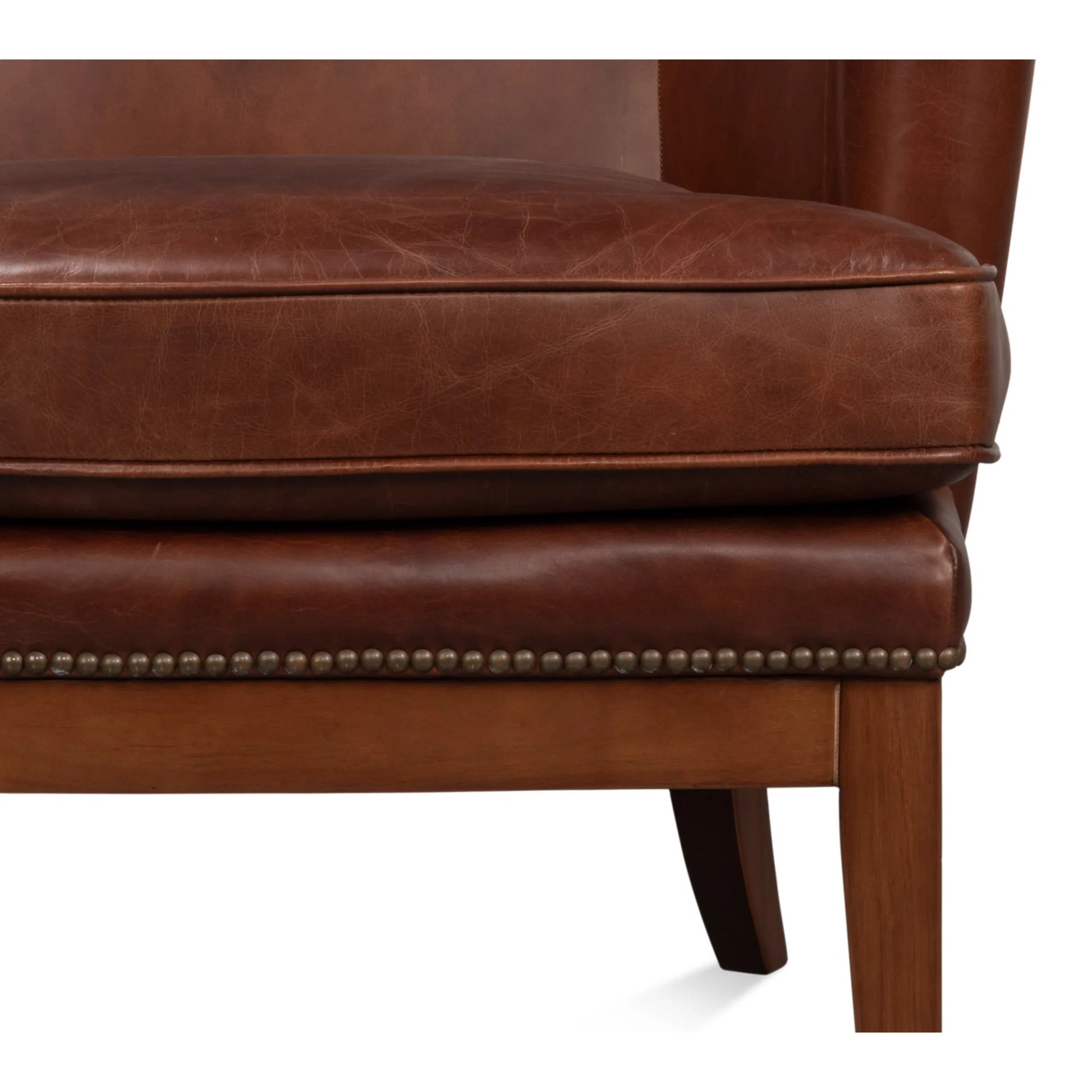 Smithfield Wing Chair by Sarreid Ltd. in newark brown. Made from leather in a traditional style.