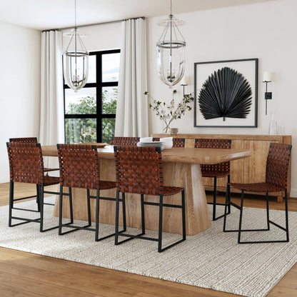 Urban Chair by Butler Specialty Company in medium brown and brown leather. Made from iron, real leather, steel metal nail heads in a modern style.