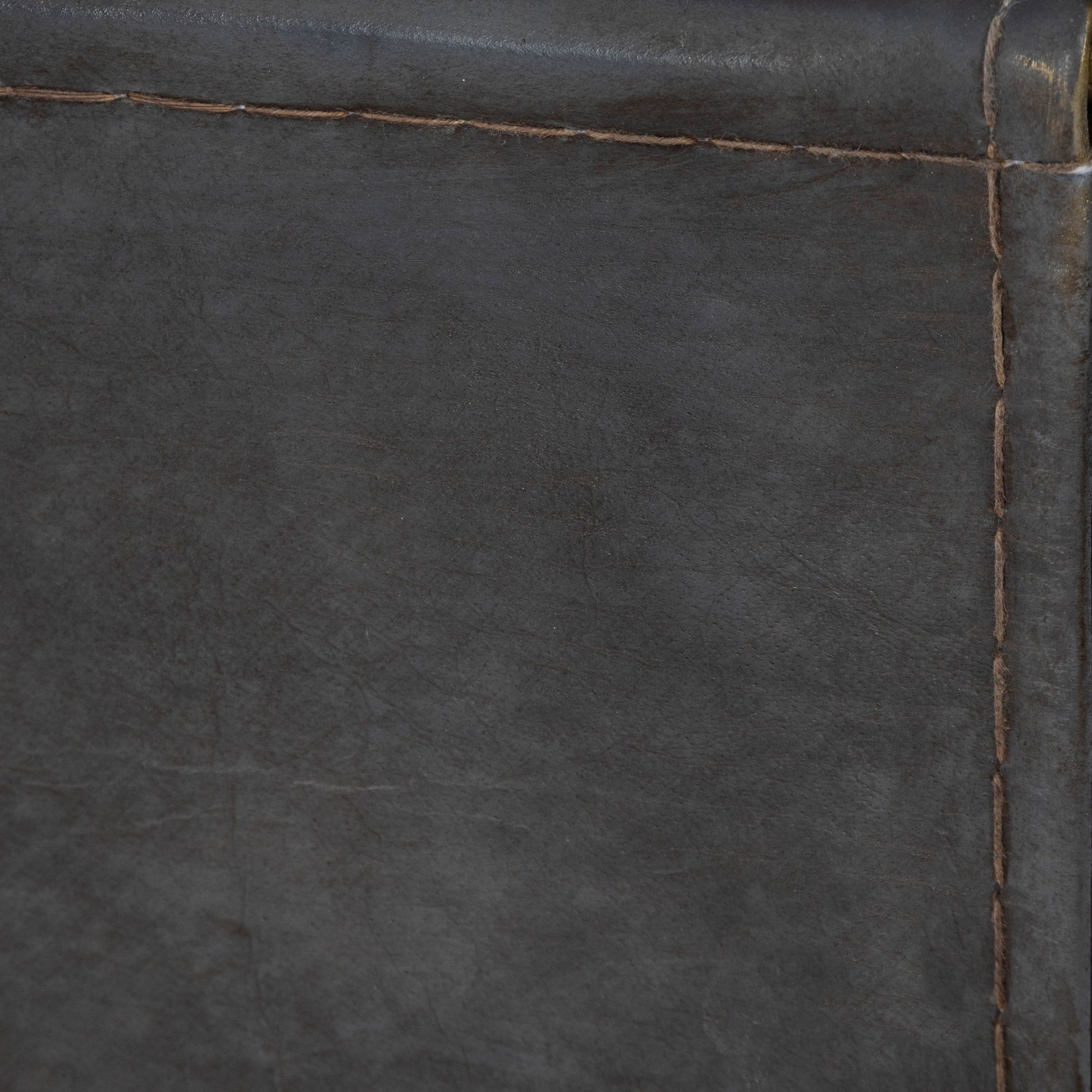 Stephanik Magazine Table by Butler Specialty Company in off white and marble, metal. Made from iron, aged silver finish, leather, aged gray-brown finish, marble in a modern style.