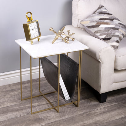 Stephanik Magazine Table by Butler Specialty Company in off white and marble, metal. Made from iron, aged silver finish, leather, aged gray-brown finish, marble in a modern style.