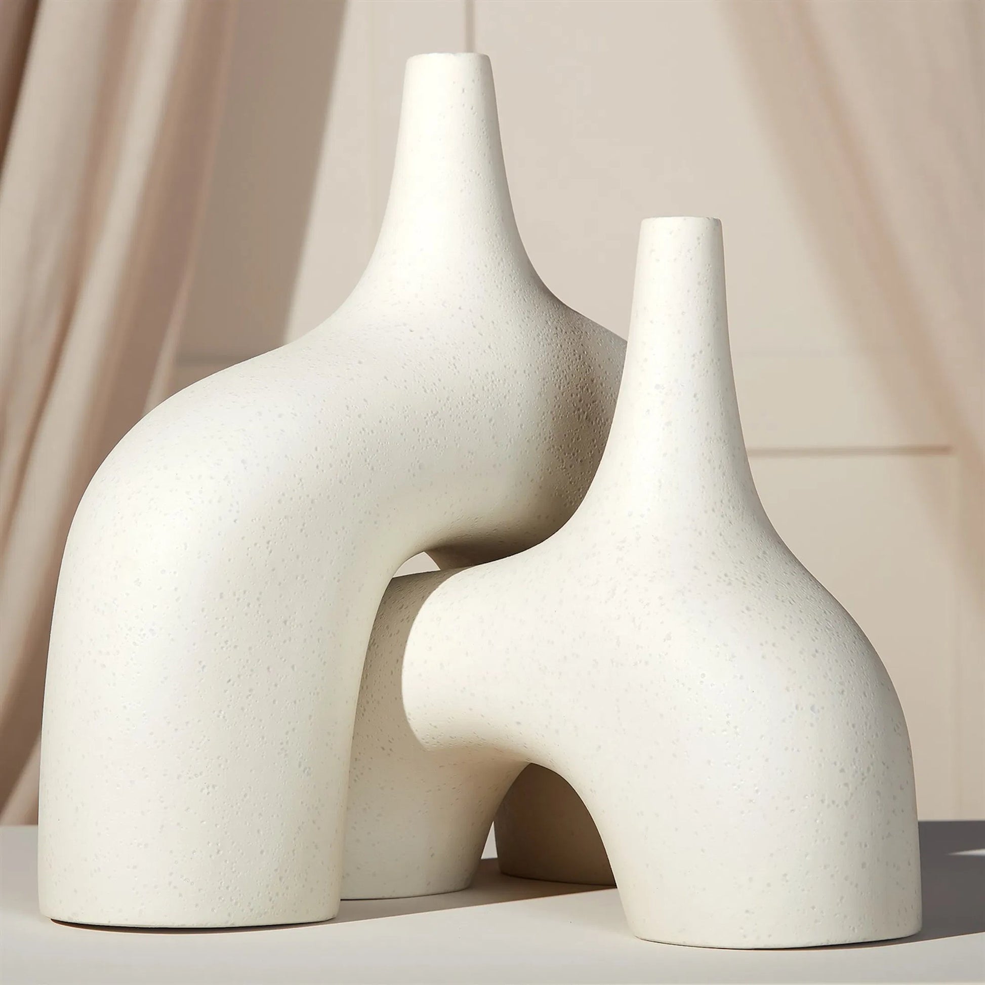 Stretch Vase by Global Views. Made from earthenware in a eclectic & global style.