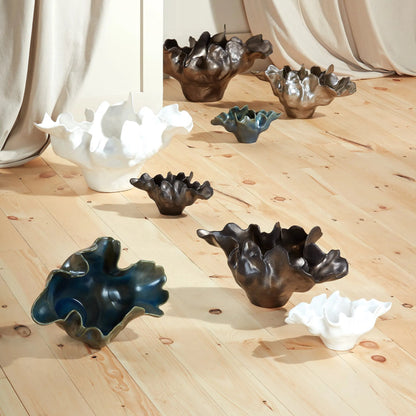 Meteor Bowl by Global Views. Made from ceramic in a coastal style.