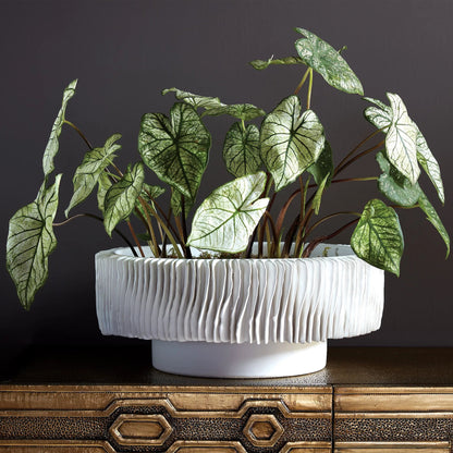 Radiator Vase by Global Views. Made from ceramic in a coastal style.