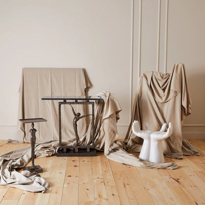 Modern Woman Table by Global Views in bronze. Made from iron, granite in a eclectic & global style.