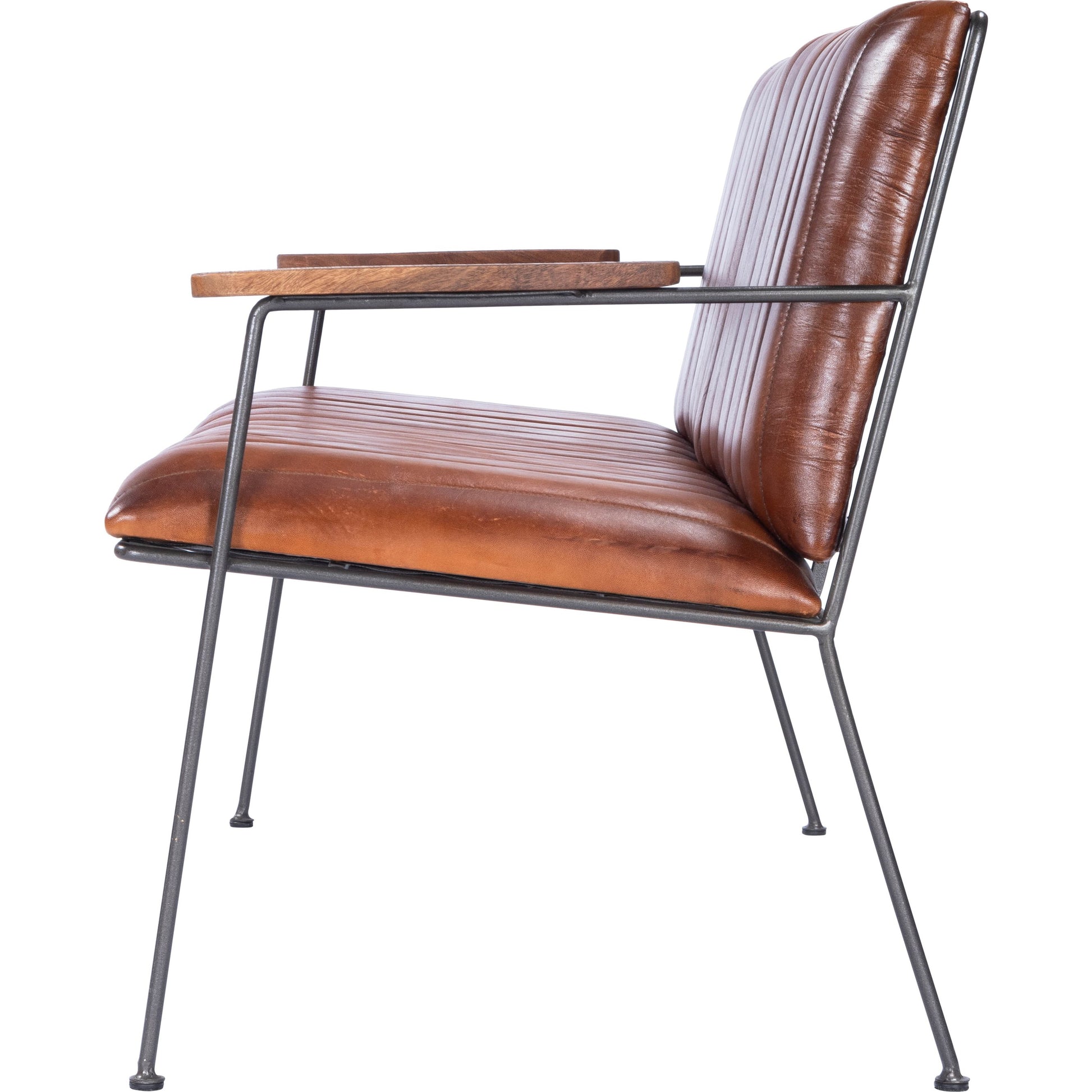 Phoenix Bench by Butler Specialty Company in medium brown and industrial chic. Made from iron, leather, mango wood solids, plywood, tris free foam cushion core, seat height 18-1, 2" h in a modern style.