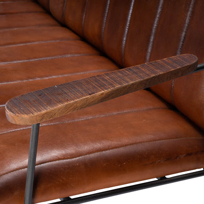 Phoenix Bench by Butler Specialty Company in medium brown and industrial chic. Made from iron, leather, mango wood solids, plywood, tris free foam cushion core, seat height 18-1, 2" h in a modern style.