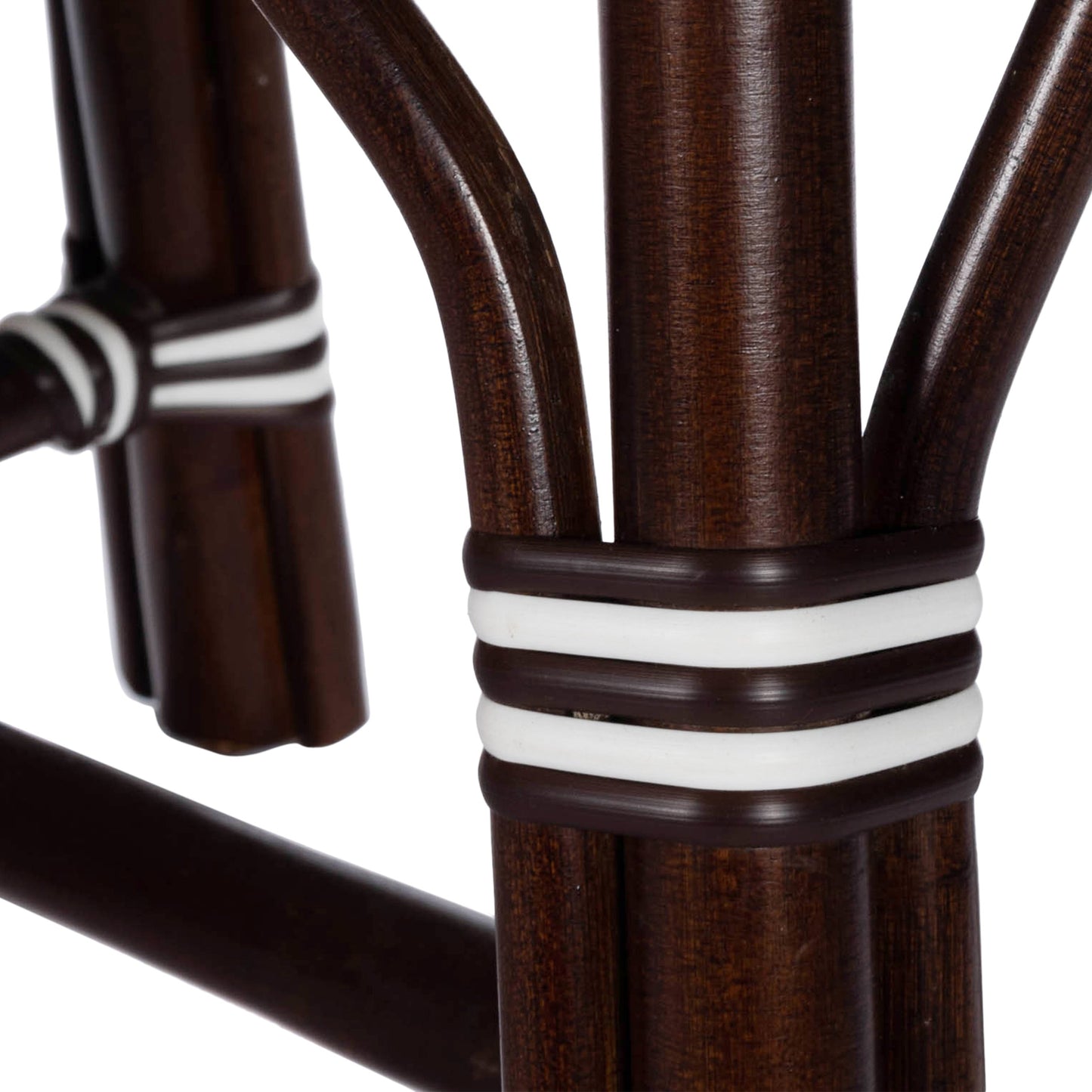 008 SR-770488 | Closeup | Marcella Rattan Bench by Butler Specialty Company in dark brown and black. Made from natural bamboo, polyethelene synthetic rattan weave in a coastal style.